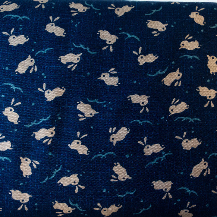 Cute Bunnies Jumping Waves Cotton Fabric