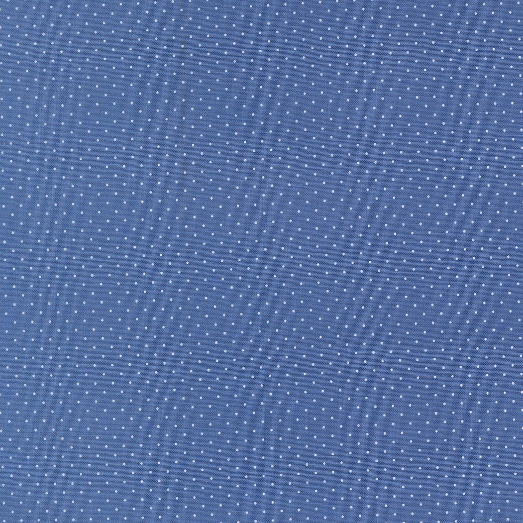 Polka Dot Cotton Fabric - Fruit Salad Cobalt (MD24724) in a deep cobalt blue shade featuring a delicate white polka dot pattern, ideal for sewing, quilting, and modern needlework projects.