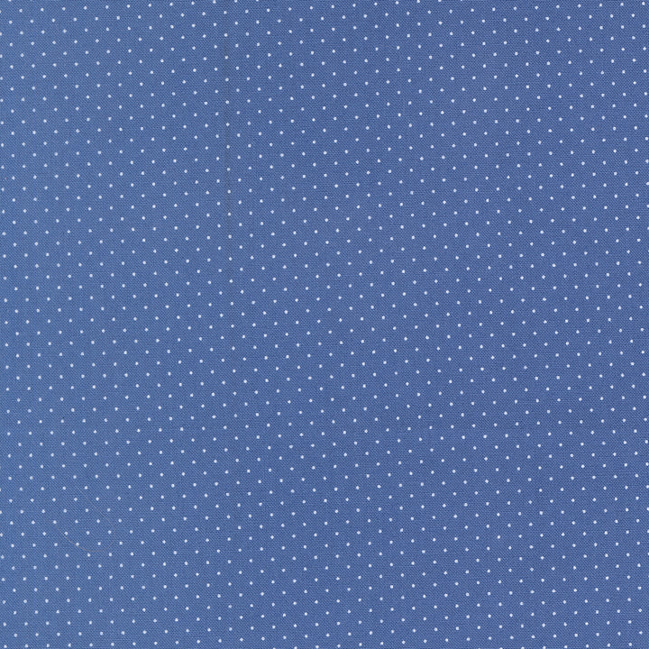 Polka Dot Cotton Fabric - Fruit Salad Cobalt (MD24724) in a deep cobalt blue shade featuring a delicate white polka dot pattern, ideal for sewing, quilting, and modern needlework projects.