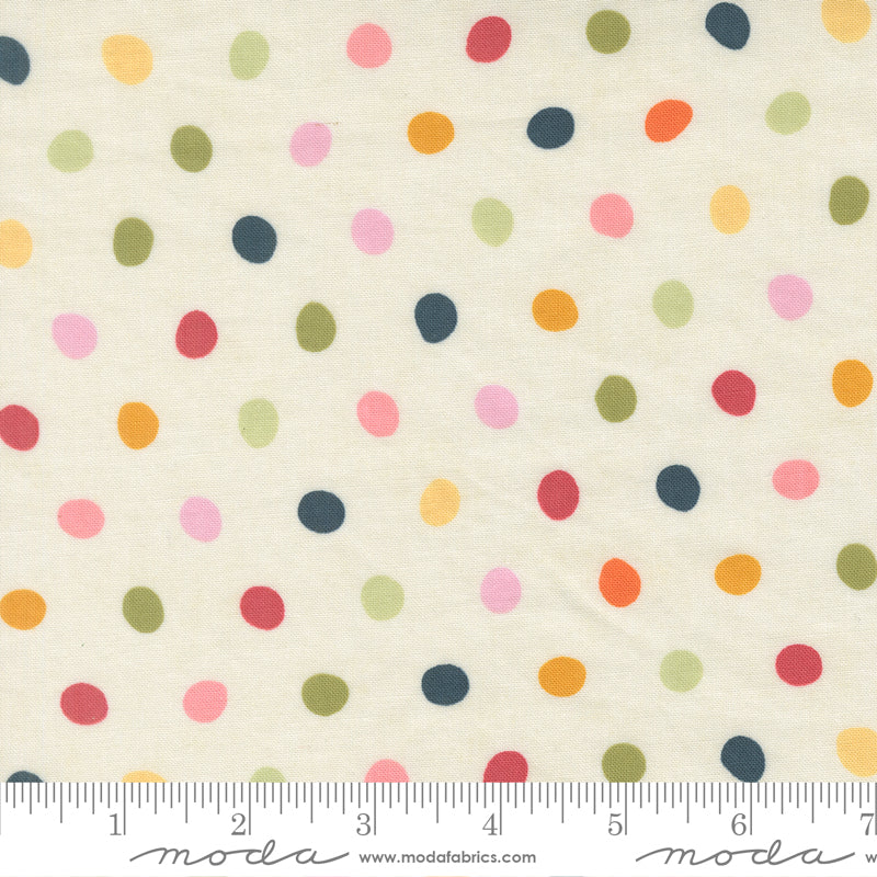 Polka Dot Cotton Fabric - Fieldrush Multi Color Dots on Opal (MD78811) featuring a soft cream background with scattered colorful dots in shades of pink, green, orange, red, and blue, ideal for quilting and modern needlework projects.