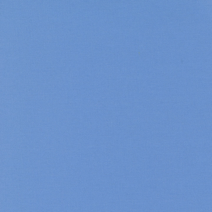 Bella Solids - Blue (MBS64) is a smooth, rich blue fabric ideal for modern needlework projects including quilting, embroidery, cross stitch, and sewing crafts.