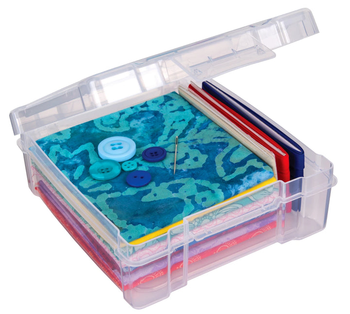 Essentials 6"x6" Plastic Storage Box showing organized colorful fabric squares and sewing buttons inside, ideal for modern needlework and embroidery thread storage.