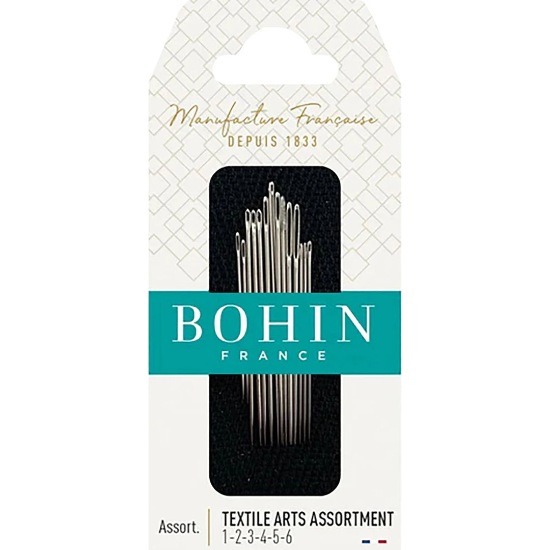Bohin Textile Arts Assortment hand sewing needle pack with 14 different needles shown in the photo