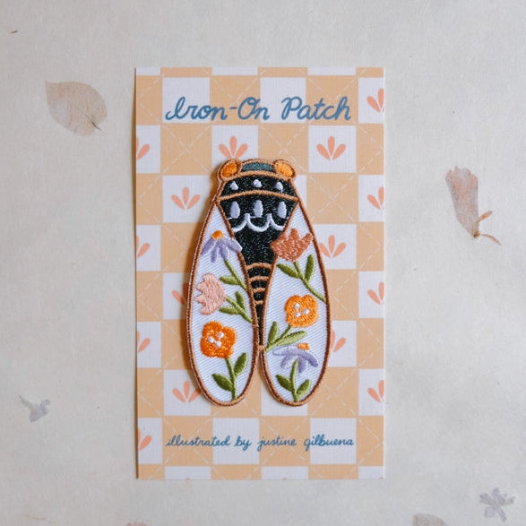 Cicadas Embroidered Iron-on Patch featuring a detailed cicada design with floral embroidery on wings, perfect for enhancing fabric and craft projects with modern needlework supplies.