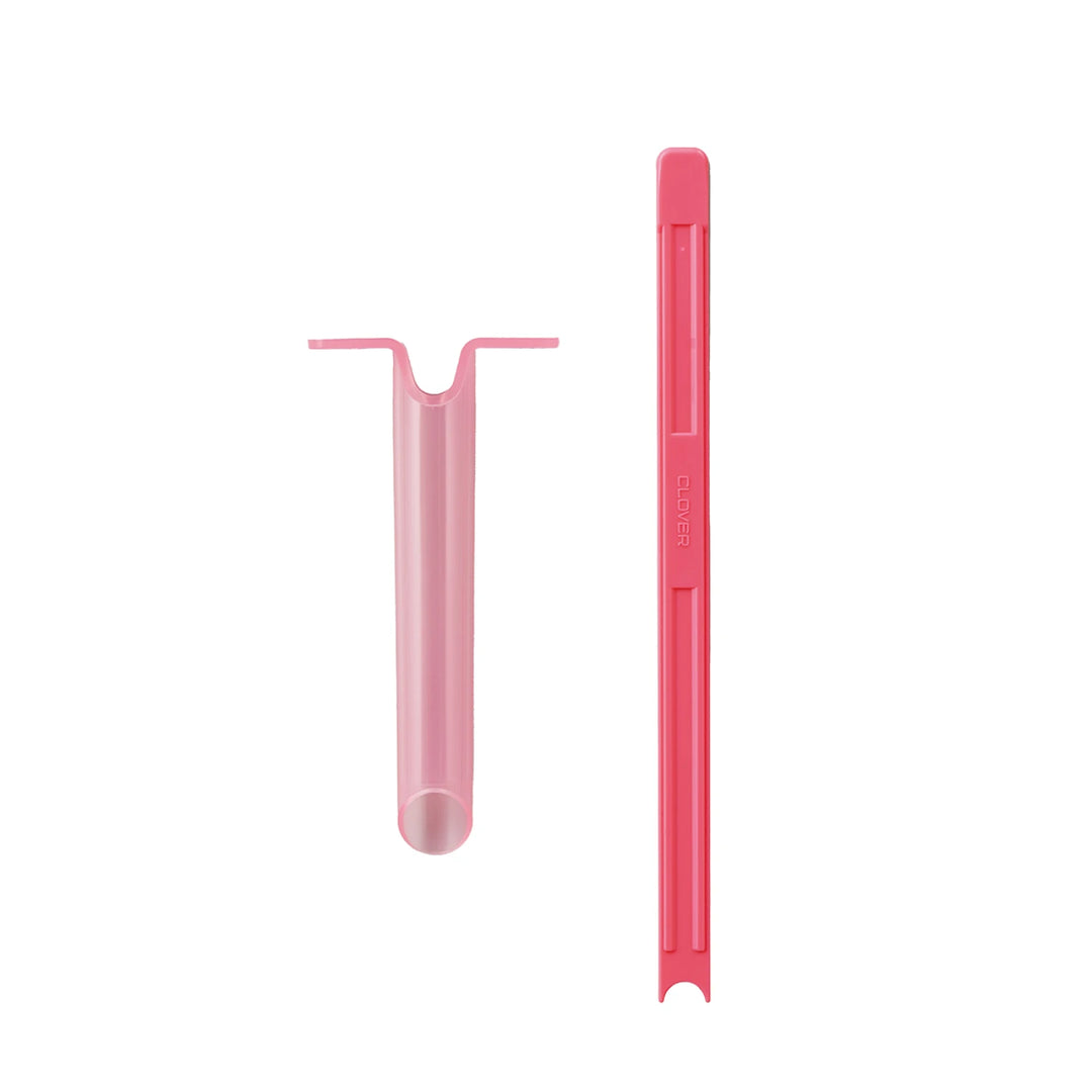 Tube & Plunger Style Stuffing Tool in pink, designed for precise and easy stuffing of small craft projects, ideal for modern needlework and sewing enthusiasts.