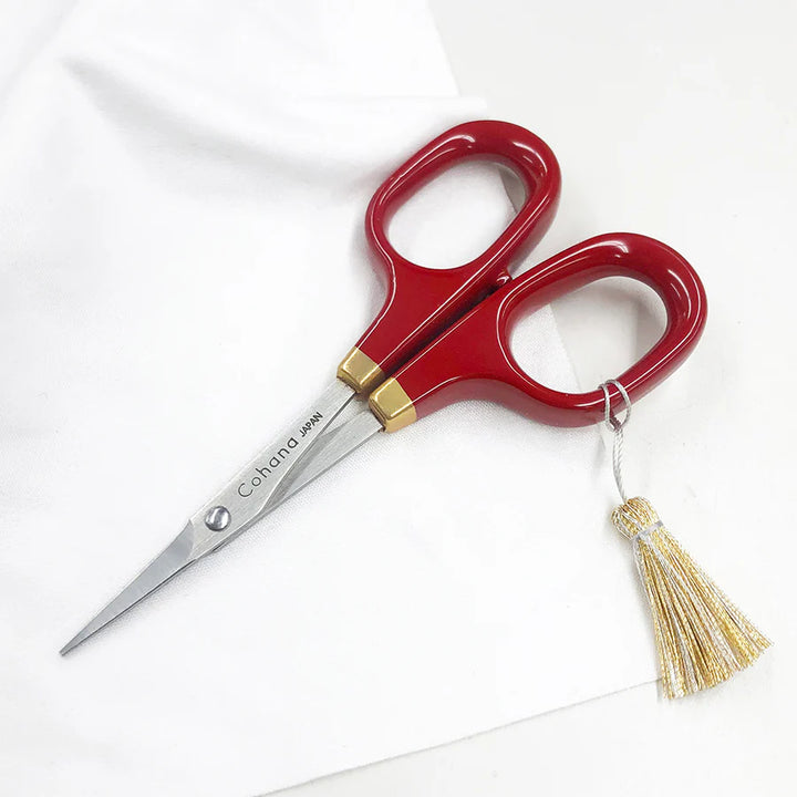 Japanese Artisan Lacquered Handle Embroidery Scissors with glossy red handles and precise stainless steel blades, ideal for detailed embroidery and needlework projects.