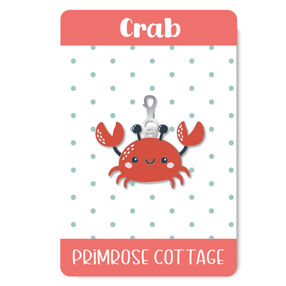 Card with a cartoon crab on a polka dot background, featuring the brand 'Primrose Cottage'.