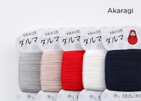 Daruma Home Thread #30 Carded Collections featuring five neatly arranged spools of high-quality embroidery thread in soft gray, pale pink, vibrant red, white, and deep navy, ideal for modern needlework and Japanese craft supplies.