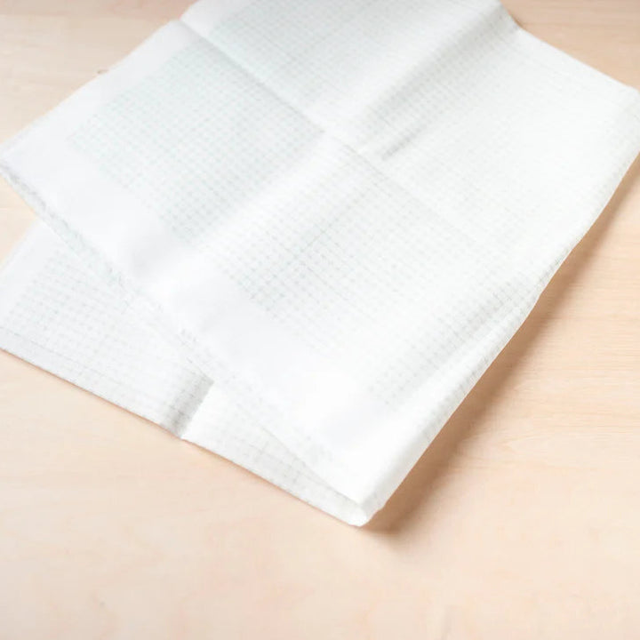 Half-Yard 5mm Straight Line Grid Sashiko Sampler fabric with subtle grid lines, perfect for precise sashiko stitching and modern needlework projects using Japanese craft supplies.