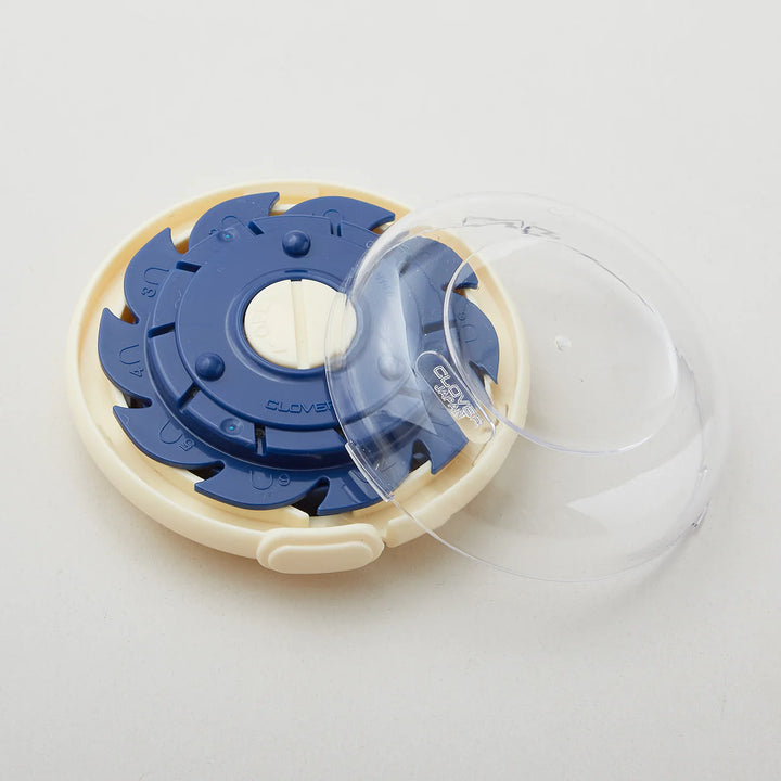 Dome Threaded Needle Case featuring a compact design with multiple needle size slots and a clear protective cover, ideal for organizing needles in modern needlework projects.
