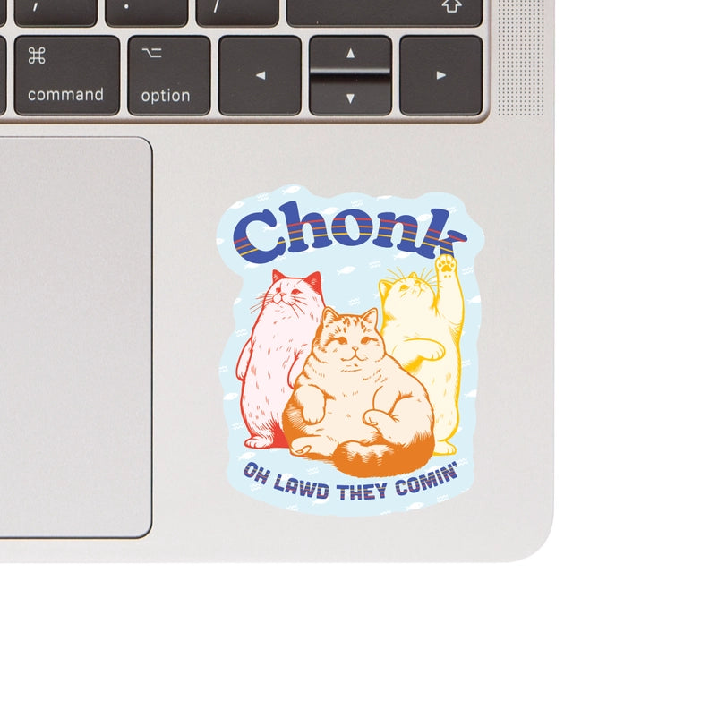 Chonk Cats Vinyl Sticker featuring three chubby cats in red, brown, and yellow with playful text on a laptop surface, perfect for modern needlework and craft enthusiasts.