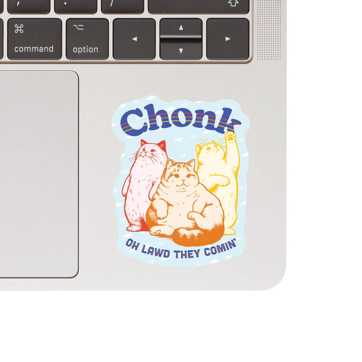 Chonk Cats Vinyl Sticker featuring three chubby cats in red, brown, and yellow with playful text on a laptop surface, perfect for modern needlework and craft enthusiasts.