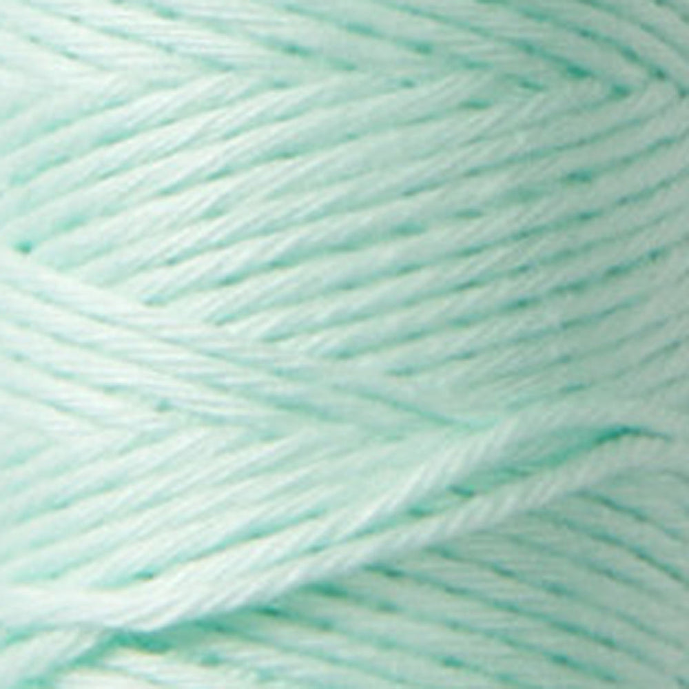 Close-up of soft mint-colored thread strands from Cosmo Hidamari Sashiko Thread - Mint (#23), ideal for Japanese craft supplies and sashiko embroidery projects.
