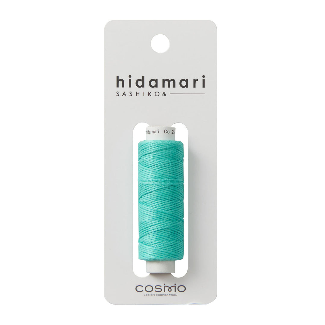 Cosmo Hidamari Sashiko Thread - Teal Breeze (#25) spool of vibrant teal embroidery thread, ideal for sashiko and Japanese craft supplies in modern needlework projects.