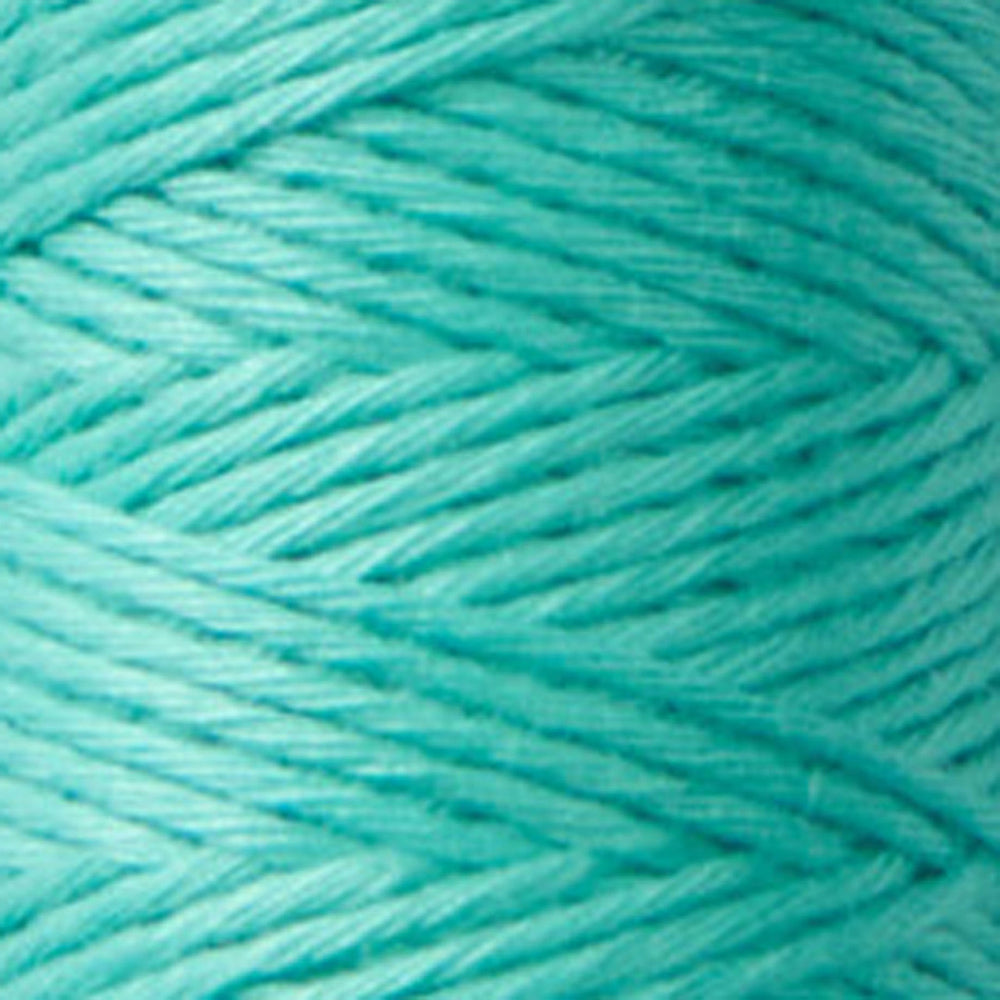 Close-up of finely twisted teal embroidery thread spool labeled Cosmo Hidamari Sashiko Thread - Teal Breeze (#25), ideal for sashiko and other Japanese craft needlework projects.