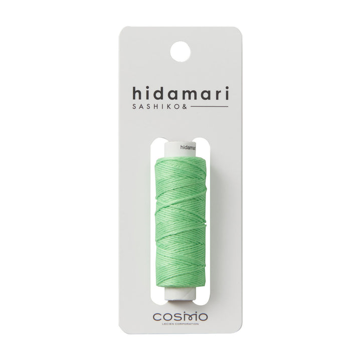 Cosmo Hidamari Sashiko Thread - Pistachio (#27) spool in light green, high-quality Japanese craft supply ideal for sashiko embroidery and modern needlework projects.