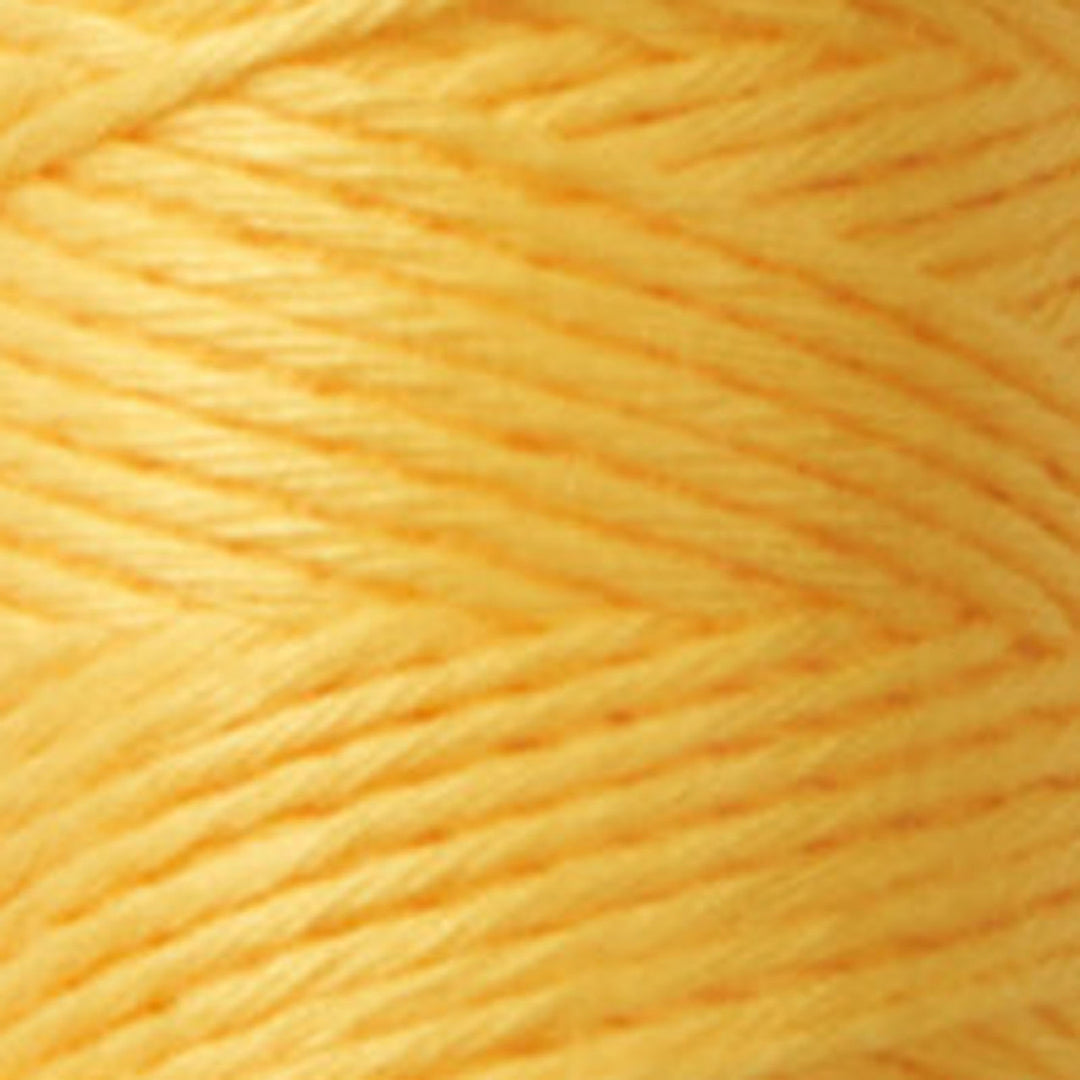 Close-up view of vibrant yellow embroidery thread showcasing the smooth texture and fine strands of Cosmo Hidamari Sashiko Thread - Goldenrod (#28), ideal for Japanese craft supplies.