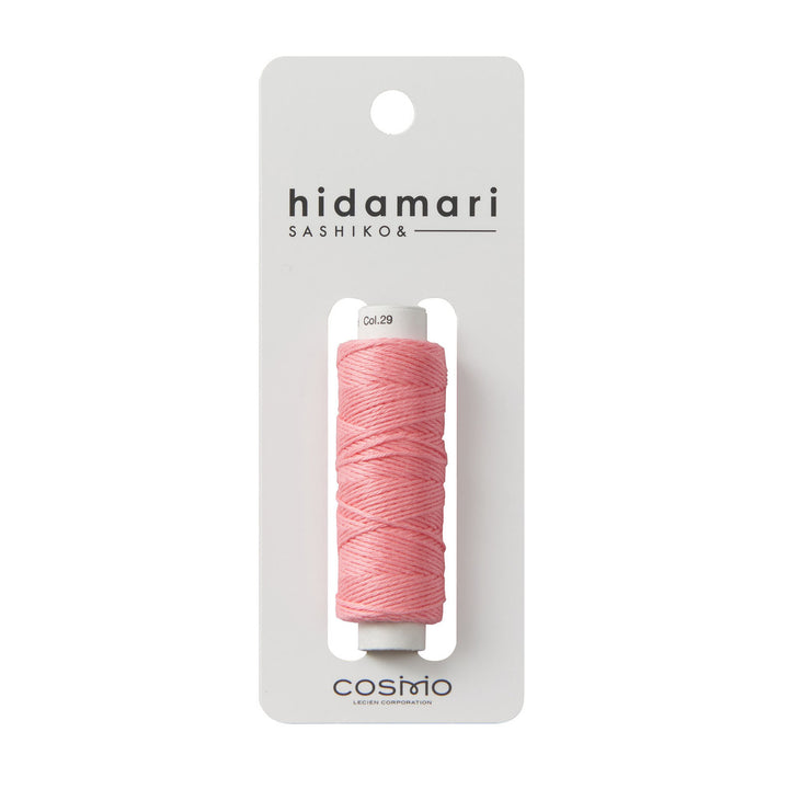 Cosmo Hidamari Sashiko Thread - Salmon (#29) displayed on a white card, showcasing soft pink thread ideal for Sashiko embroidery and Japanese craft supplies.