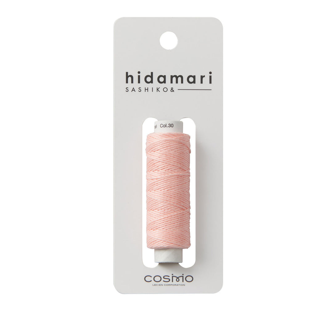 Cosmo Hidamari Sashiko Thread - Soft Pink (#30) spool of fine Japanese craft embroidery thread for sashiko and modern needlework projects.