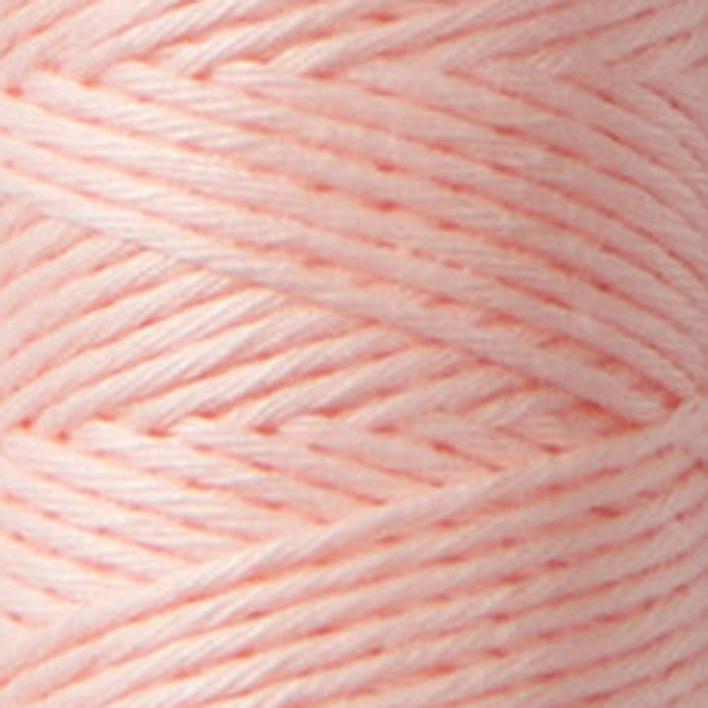 Close-up view of soft pink thread strands in Cosmo Hidamari Sashiko Thread - Soft Pink (#30), ideal for Japanese craft supplies and modern needlework projects.