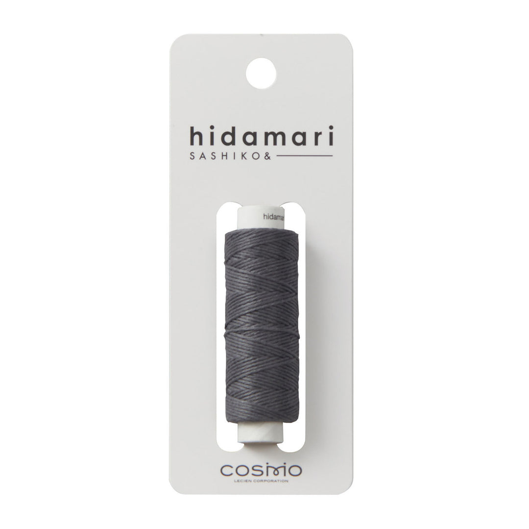 Cosmo Hidamari Sashiko Thread - Iron (#35) in dark gray, premium Japanese craft thread for sashiko embroidery and needlework projects.