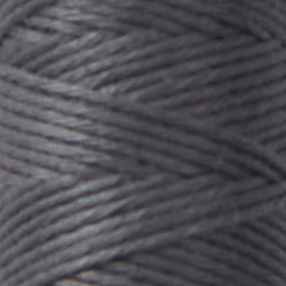 Close-up view of dark gray thread spool featuring Cosmo Hidamari Sashiko Thread - Iron (#35), ideal for Sashiko embroidery and Japanese craft supplies.