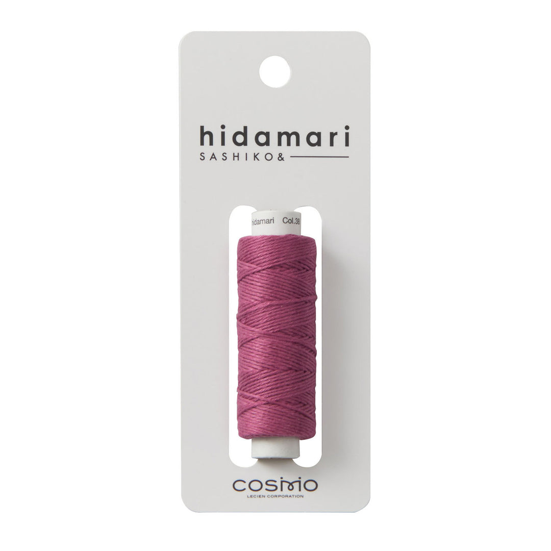Cosmo Hidamari Sashiko Thread - Mulberry Blush (#38) spool of high-quality Japanese embroidery thread in a deep pink shade, ideal for sashiko and needlework projects.