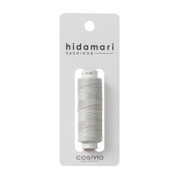 Cosmo Hidamari Sashiko Thread - Misty Coast (#39) in a soft gray tone, ideal for Japanese craft supplies and modern needlework projects including sashiko embroidery.