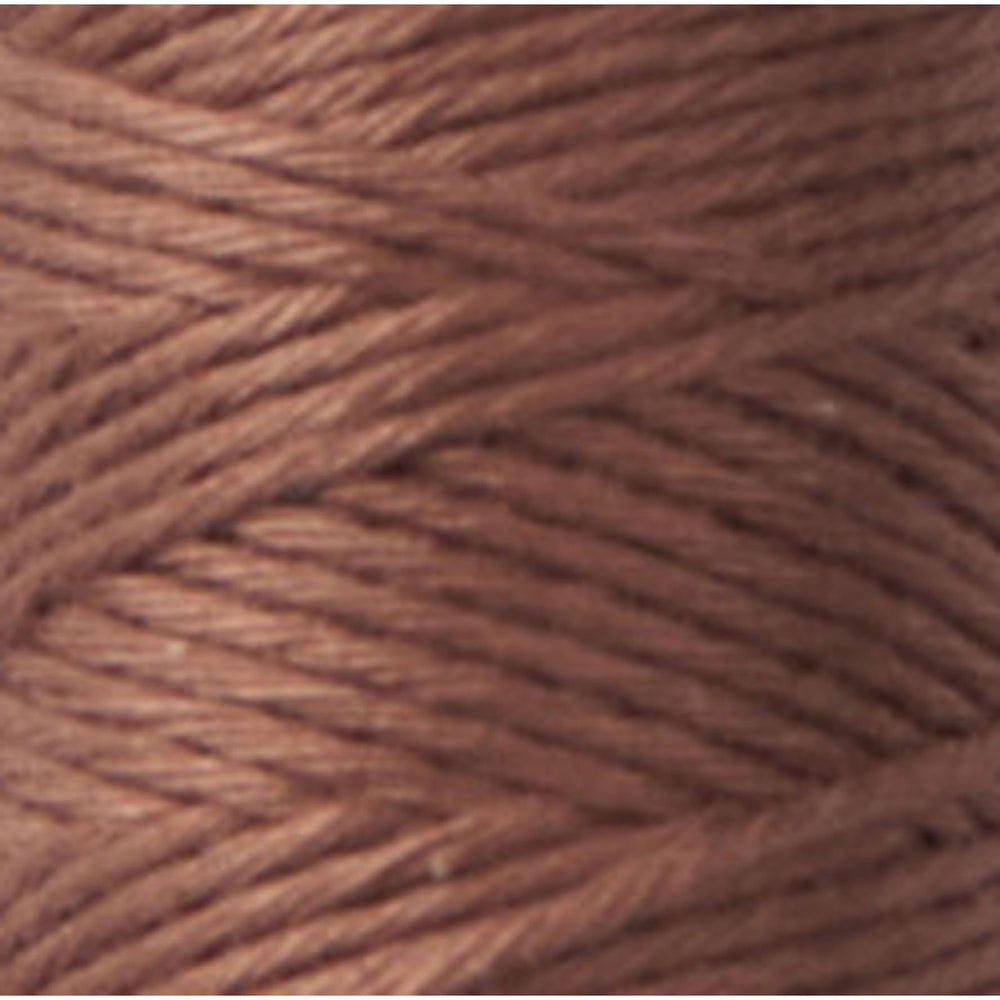 Close-up of soft, tightly wound brown thread spool, showcasing texture and color of Cosmo Hidamari Sashiko Thread - Brown (#40) for Japanese craft supplies and embroidery projects.