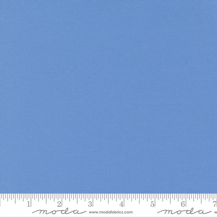 Bella Solids - Blue (MBS64) is a smooth, solid blue fabric ideal for modern needlework projects such as embroidery, cross stitch, quilting, and Sashiko supplies.