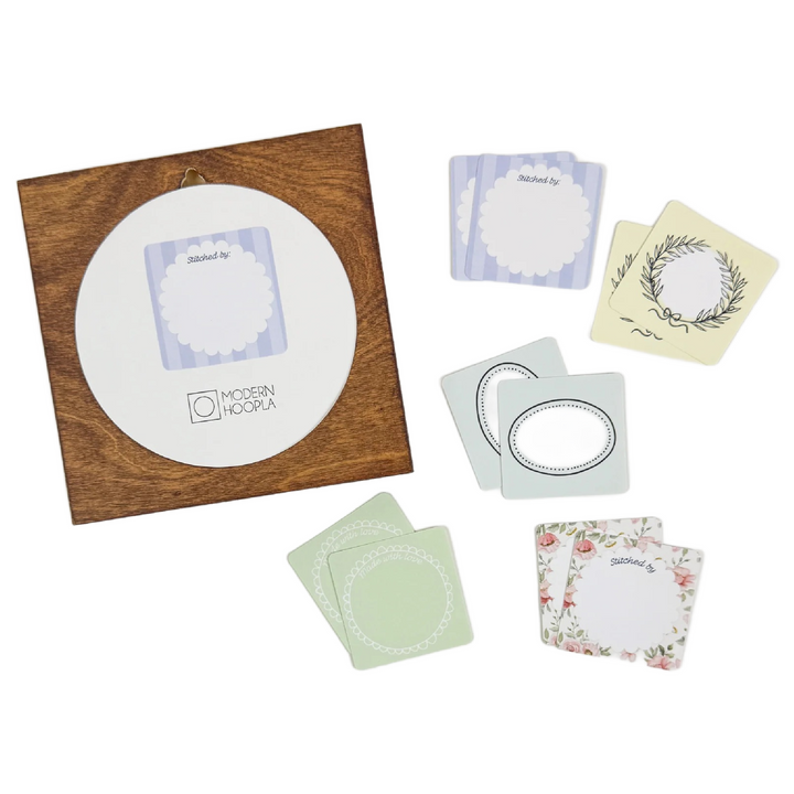 Various decorative project label stickers with floral, leafy, and minimalist border designs in soft pastel colors for organizing embroidery and needlework, "Made By" Project Label Sticker Pack.