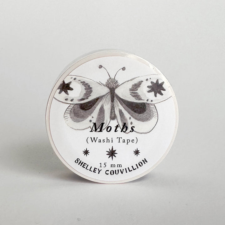 Washi tape with butterfly design and 'Shelley Couvillion' branding on a gray background