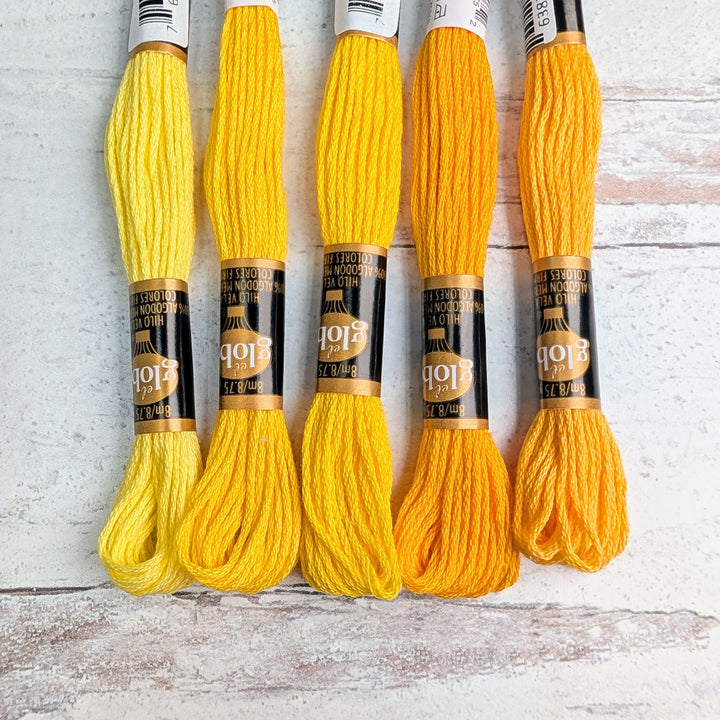 Hilo Vela El Globo Embroidery Thread (8m Skeins) -Yellows in varying shades from pale yellow to deep golden, ideal for modern needlework, cross stitch, and sashiko craft projects.