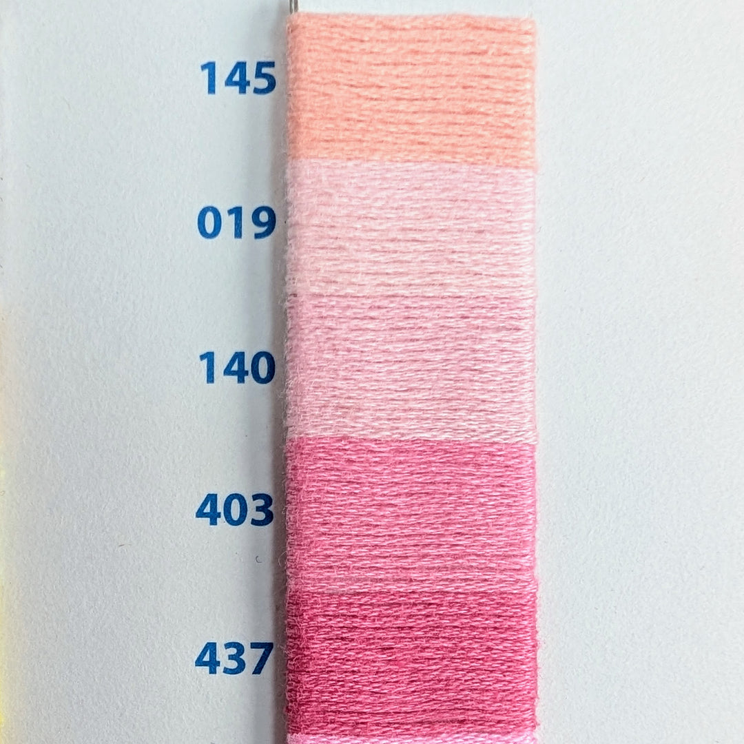 Hilo Vela El Globo Embroidery Thread (8m Skeins) - Light Pink displayed in gradient shades from soft peach to deeper pink, ideal for modern needlework and Japanese craft supplies.