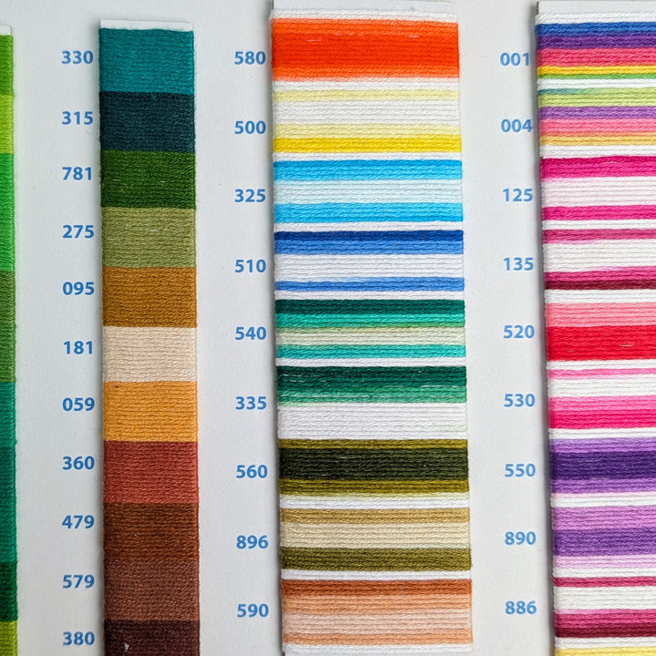 Hilo Vela El Globo Embroidery Thread (8m Skeins) - Variegated One displayed in vibrant color swatches on a thread sample card, ideal for embroidery, cross stitch, and modern needlework with premium Japanese craft supplies.