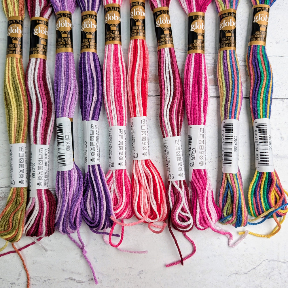 Hilo Vela El Globo Embroidery Thread (8m Skeins) - Variegated Two in various vibrant color combinations including pink, purple, red, green, and multicolor shades, ideal for modern needlework and Japanese craft supplies.