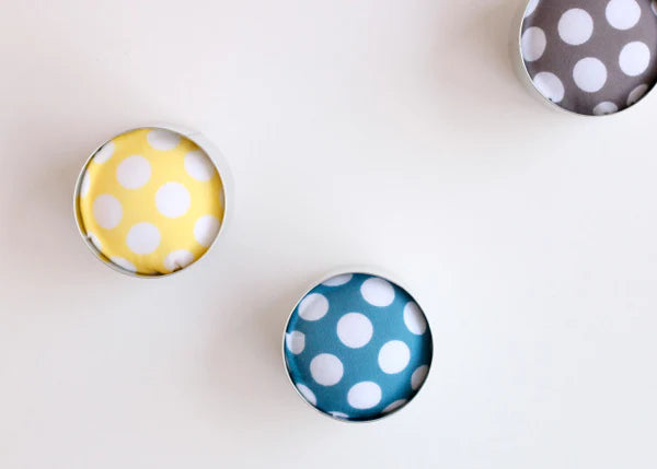 Artisan Made Japanese Pin Cushion in vibrant yellow, blue, and gray with white polka dots, perfect for modern needlework and embroidery enthusiasts.