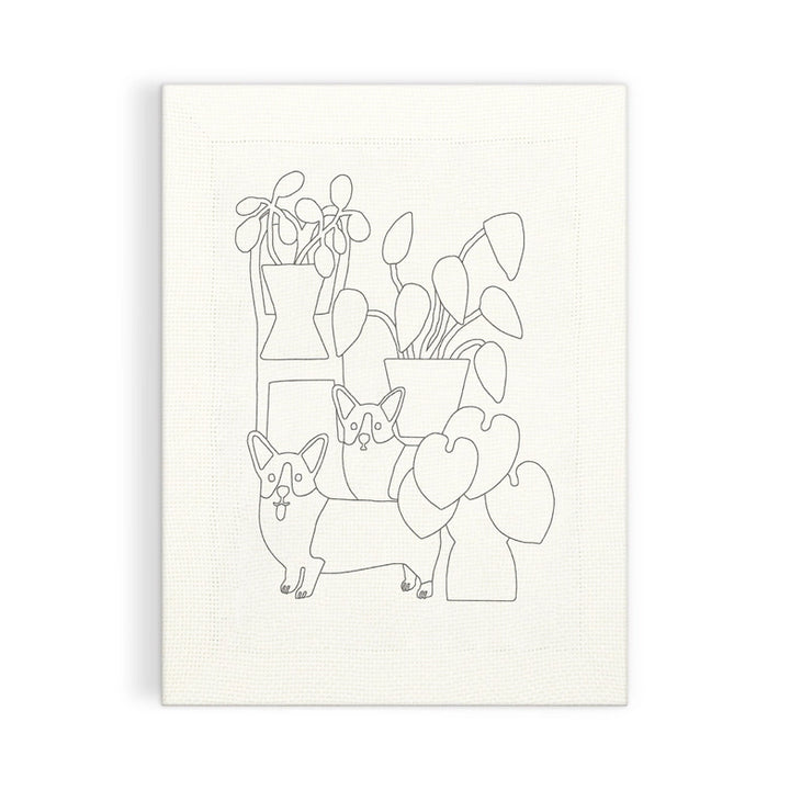 Corgi Friends Punch Needle Kit canvas featuring outlined corgi dogs among potted plants ready for embroidery with needlepoint thread and craft supplies.
