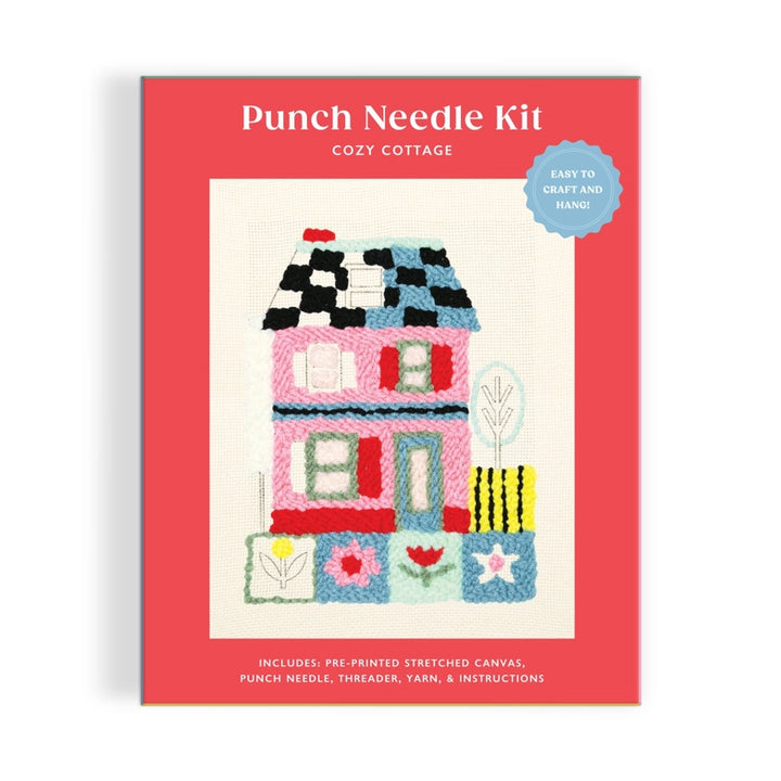 Cozy Cottage Punch Needle Kit featuring a colorful punch needle design of a two-story cottage with flowers and a tree on pre-printed stretched canvas, perfect for modern needlework enthusiasts.