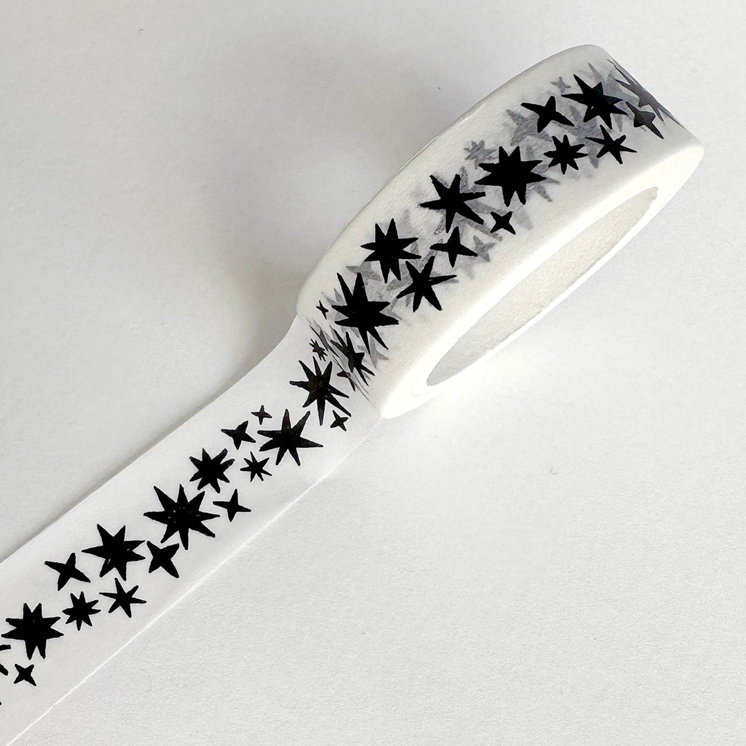 White tape with black star pattern on a white background