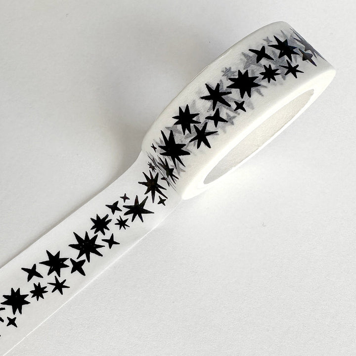 White tape with black star pattern on a white background