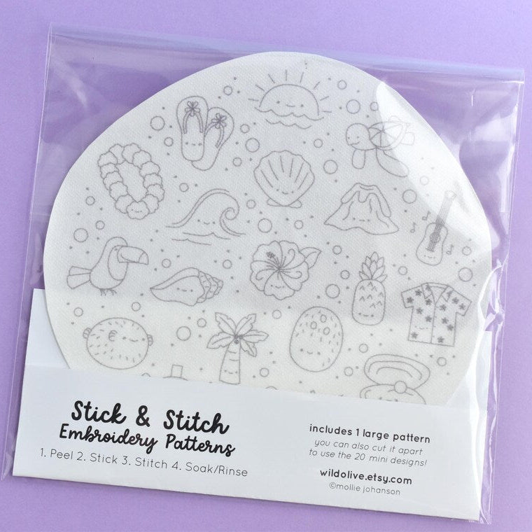 Packaged stick and stitch embroidery patterns on a purple background