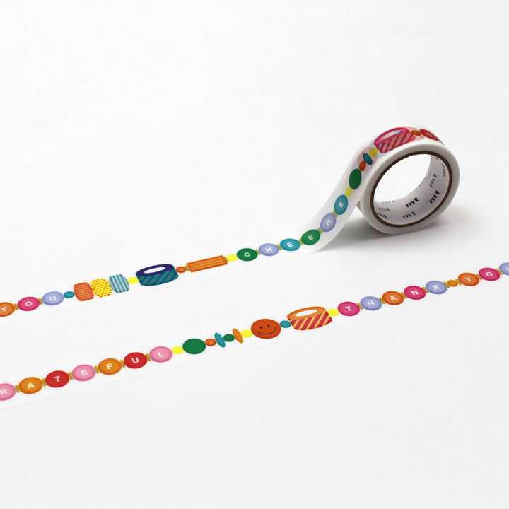 Japanese mt Washi Tape - Thank You featuring colorful round letters and cheerful icons, ideal for adding a playful touch to Japanese craft supplies and modern needlework projects.