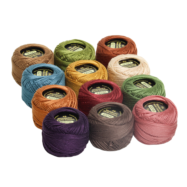 Set of colorful embroidery thread spools in warm earthy and muted tones, labeled Wonderfil Perle Cotton Set - Vicki McCarty Harvest, ideal for modern needlework and cross stitch projects.