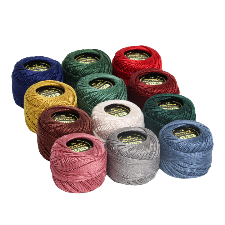Twelve colorful spools of embroidery thread in blue, green, red, yellow, brown, pink, gray, and cream shades, neatly arranged, featuring the Wonderfil Perle Cotton Set - Vicki McCarty Winter.