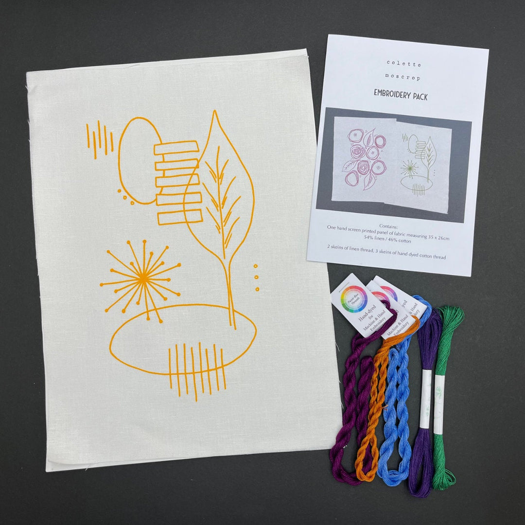Freestyle Embroidery Kit - Leaf Print featuring a modern leaf design printed on fabric, accompanied by colorful embroidery floss and an instruction sheet for hand embroidery.
