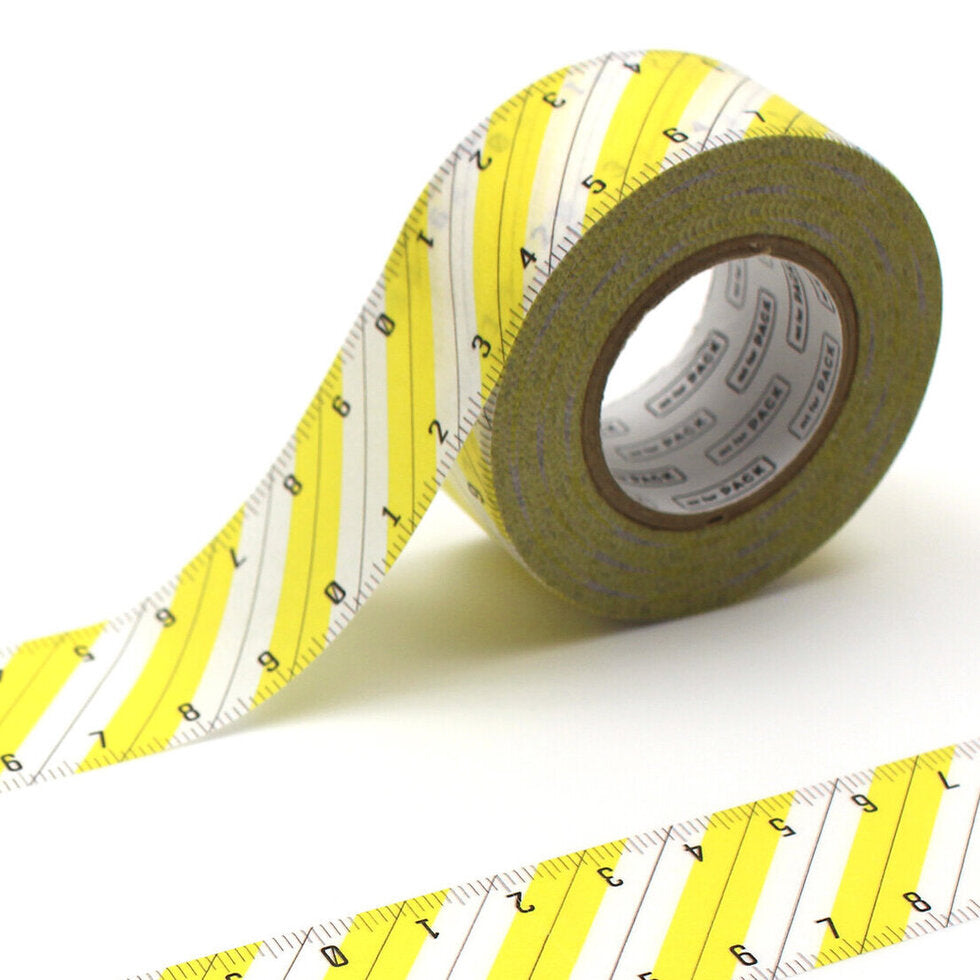 Roll of mt Pack Japanese Washi Tape - Yellow Striped Ruler featuring a yellow and white diagonal striped pattern with black ruler markings, ideal for Japanese craft supplies and needlework projects.