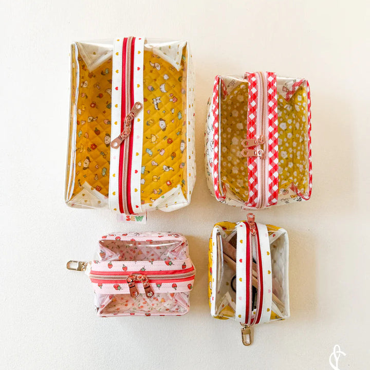 Set of fabric pouches with zipper on a white background